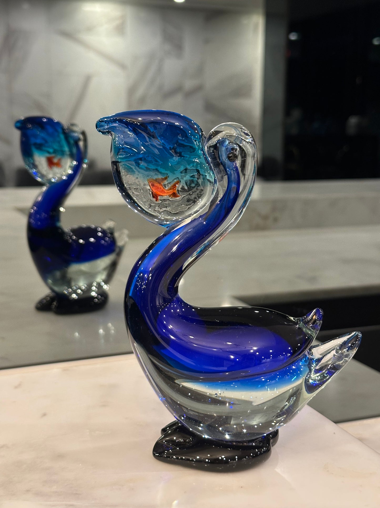 Goldfish and Pelican